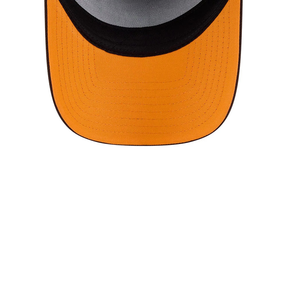 Dexter's Laboratory Dark Brown New Era 9FORTY A-Frame Adjustable Cap, inside view showing the orange undervisor contrasting with the dark brown edge, grey inner crown stitching, and neat seam lines running across the structured visor.