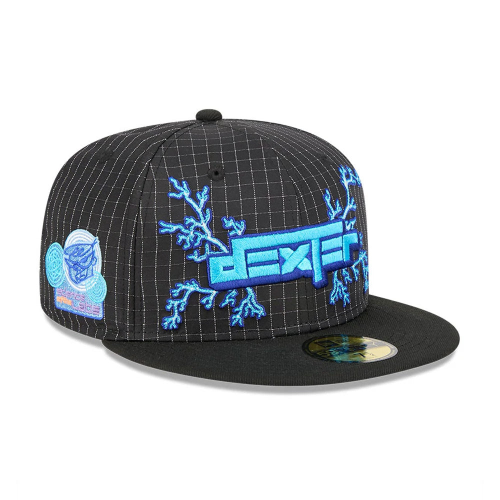 Dexter's Laboratory Electric Black New Era 59FIFTY Fitted Cap, front view showing bright blue embroidered Dexter’s logo on the grid-patterned black crown, electric blue graphics extending outward.