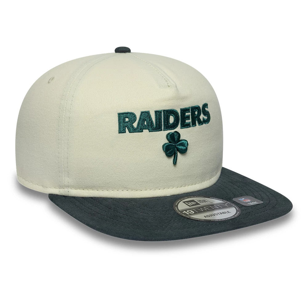 Las Vegas Raiders NFL Metallic Logo Cream New Era 19TWENTY Adjustable Cap, front view showing the dark green raised embroidered Raiders script with a shamrock on the front panel, black flat visor, and 19TWENTY size sticker on the visor.