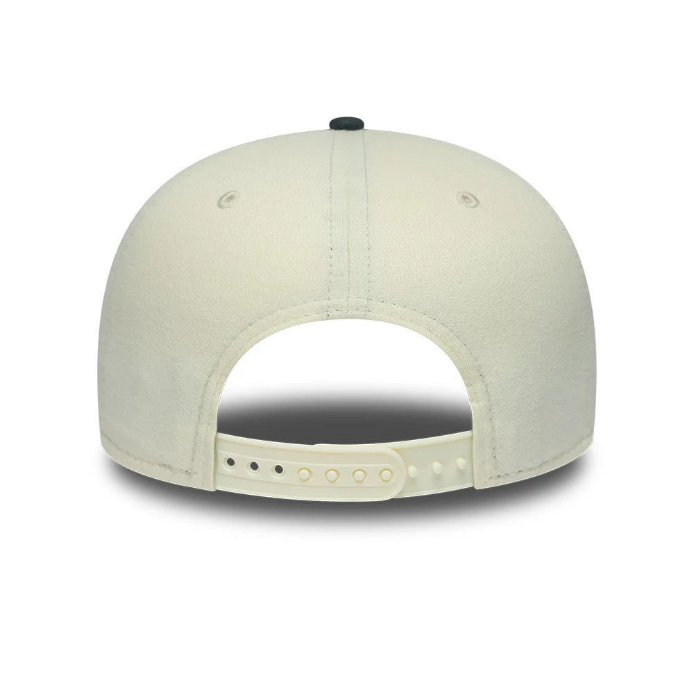 Boston Celtics NBA Metallic Logo Cream New Era 19TWENTY Adjustable Cap, rear view showing a curved cream crown with matching eyelets, a black top button, and a cream snap closure on the open adjustable back for a customised fit.