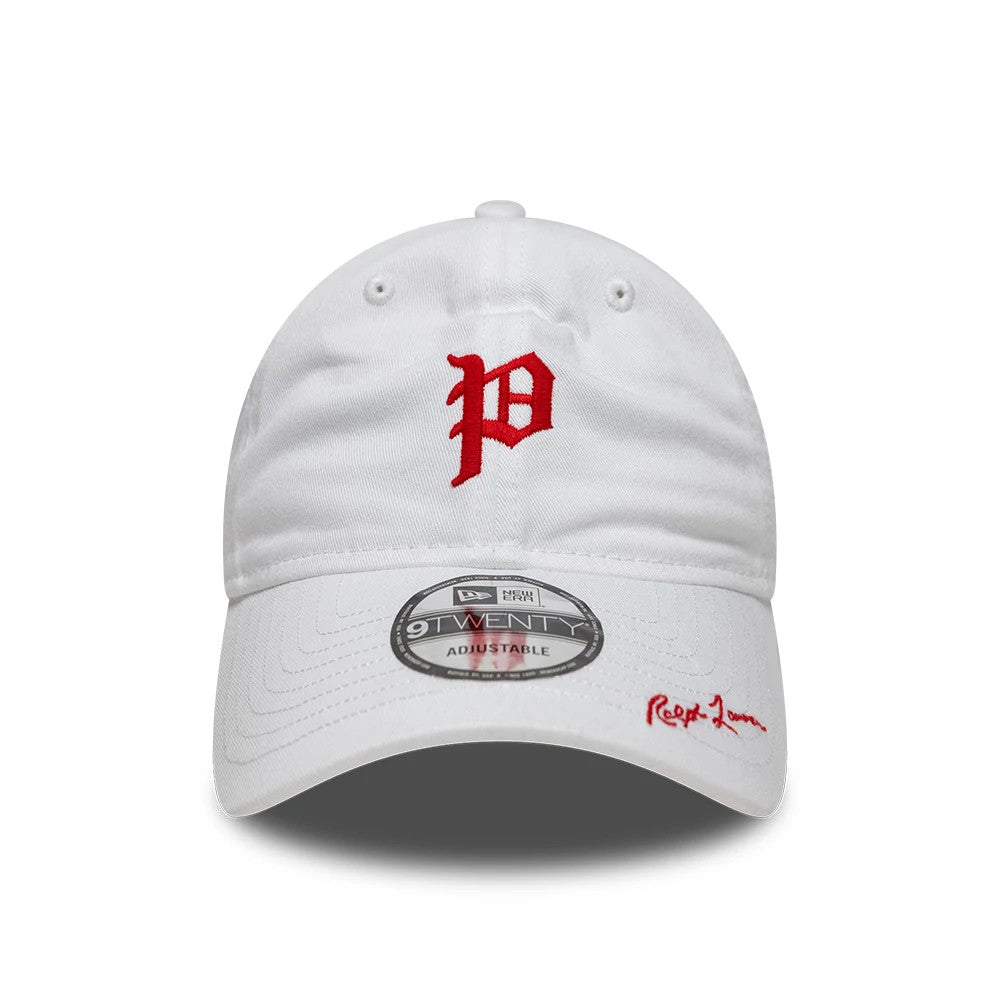 Philadelphia Phillies Ralph Lauren X MLB White New Era 9TWENTY Adjustable Cap, front view showing the red embroidered letter P on the structured white crown, a 9TWENTY size sticker on the white curved visor, and Ralph Lauren signature in red.