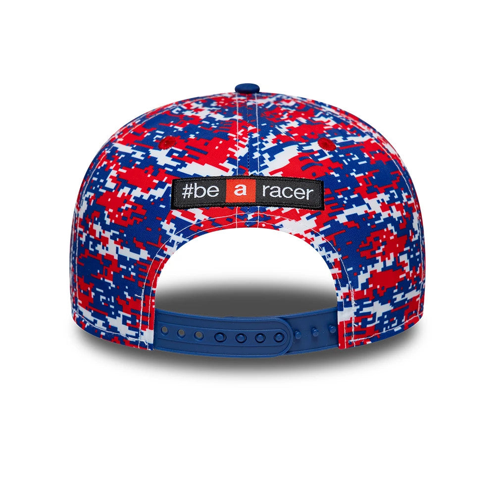 Aprilia Replica Jorge Martin Le Mans Race Special Blue New Era 9SEVENTY Stretch Snap Adjustable Cap, rear view showing the #be a racer patch prominently embroidered across the back panels, featuring a red, blue and white digital camouflage pattern.