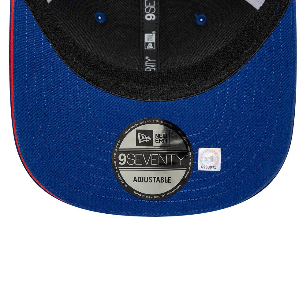 Aprilia Replica Jorge Martin Le Mans Race Special Blue New Era 9SEVENTY Stretch Snap Adjustable Cap, inside view showing the black sweatband, blue undervisor with a 9SEVENTY size sticker, and branded taping along the seam.
