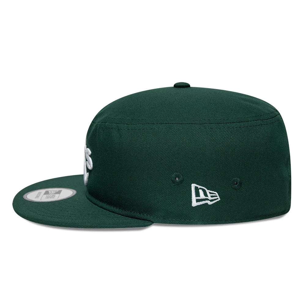 Athletics MLB Poly Dark Green New Era Pillbox Adjustable Cap, side view showing the embroidered New Era flag logo on the left side, the structured crown with multiple eyelets, and the flat visor featuring a 59FIFTY size sticker.