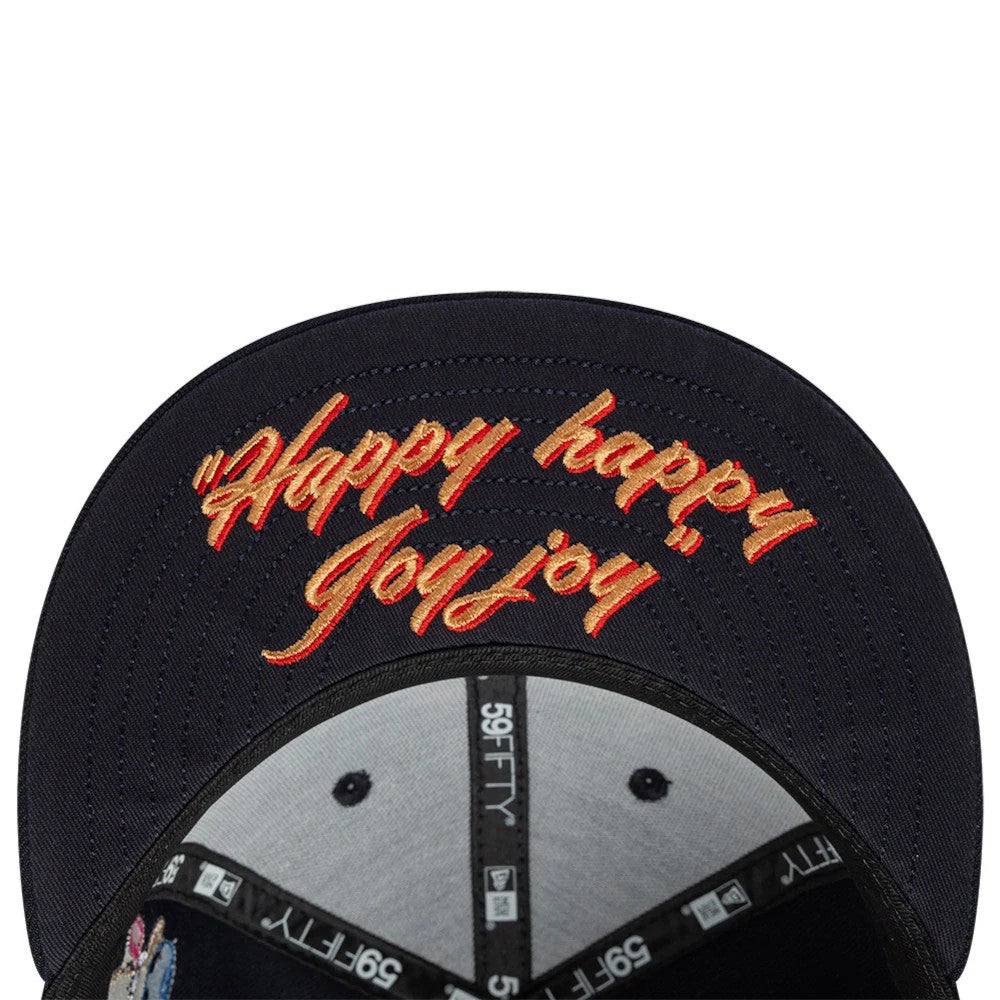Ren & Stimpy Happy Happy Joy Joy Navy New Era 59FIFTY Fitted Cap, inside view showing the embroidered Happy happy joy joy text in red and gold on the navy undervisor, with black and grey internal taping and 59FIFTY branding.