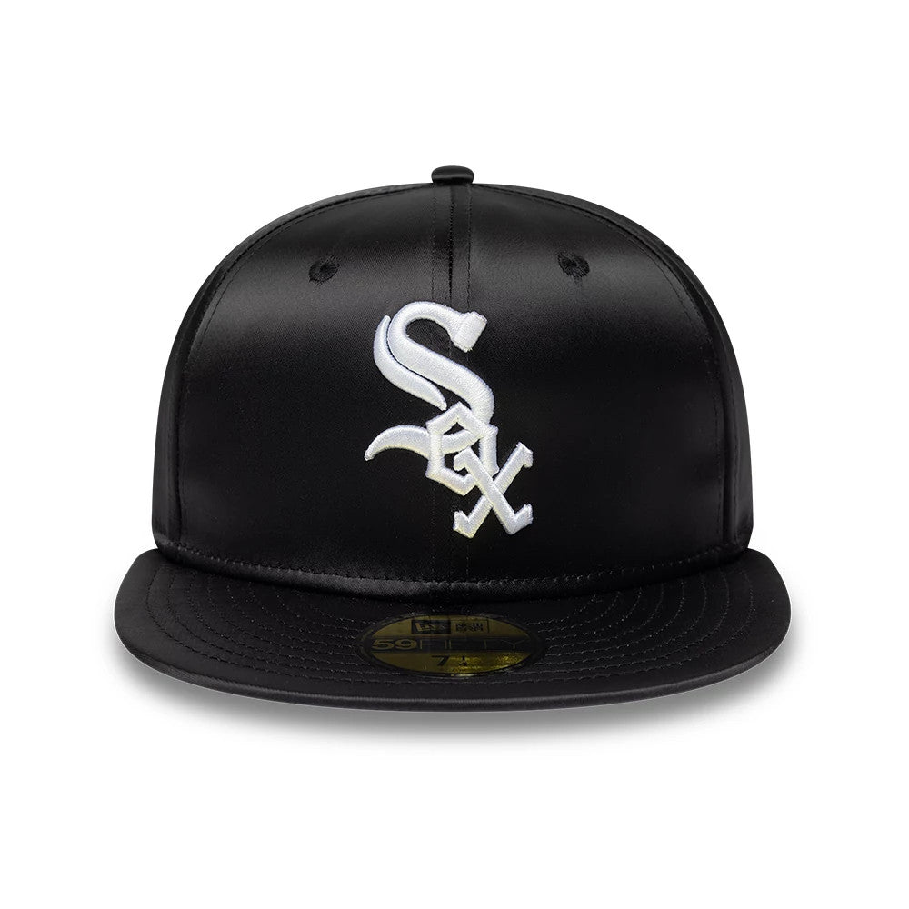 Chicago White Sox MLB Satin Black New Era 59FIFTY Fitted Cap, front view showing the white embroidered Sox logo in raised detail on the structured black satin crown, with a flat black visor and a gold 59FIFTY size sticker.