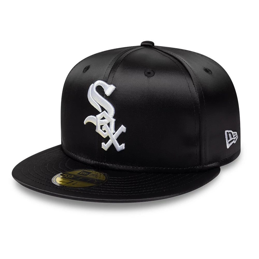 Chicago White Sox MLB Satin Black New Era 59FIFTY Fitted Cap, front view showing the raised white embroidered Sox logo on the structured black satin crown, flat black visor with gold 59FIFTY size sticker, and New Era flag logo on the left side.