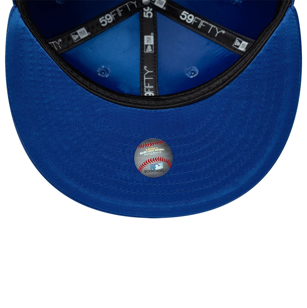 Detroit Tigers MLB Satin Blue New Era 59FIFTY Fitted Cap, inside view showing black taping with 59FIFTY branding, a blue lining, and an MLB holographic sticker centred on the blue undervisor.