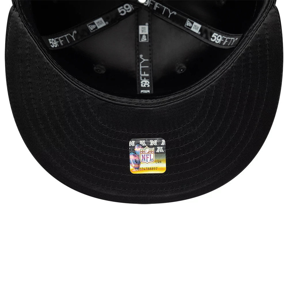 Las Vegas Raiders NFL Satin Black New Era 59FIFTY Fitted Cap, inside view showing the branded black taping, a black sweatband, and a rectangular holographic sticker positioned centrally on the black undervisor.