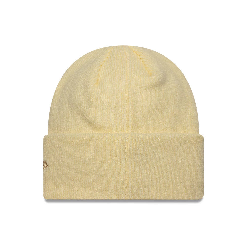 New Era Mohair Pastel Yellow Wide Cuff Knit Beanie Hat, front view showing a soft pastel yellow colour and wide cuff with a textured finish, featuring the New Era flag logo embroidered discreetly on the side of the cuff.
