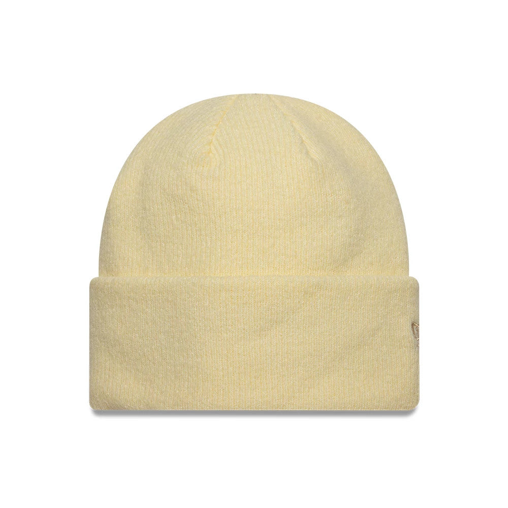 New Era Mohair Pastel Yellow Wide Cuff Knit Beanie Hat, front view showing the soft pastel yellow fabric with a wide cuff design, and the embroidered New Era flag logo on the left side.