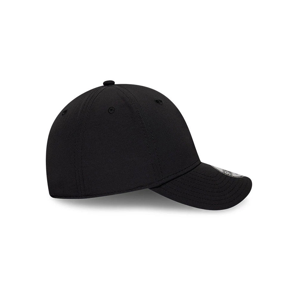 LA Dodgers MLB Recycled Black New Era 9FORTY Adjustable Cap, side view showing the curved visor and round black top button, with embroidered eyelets on the structured low-profile crown.