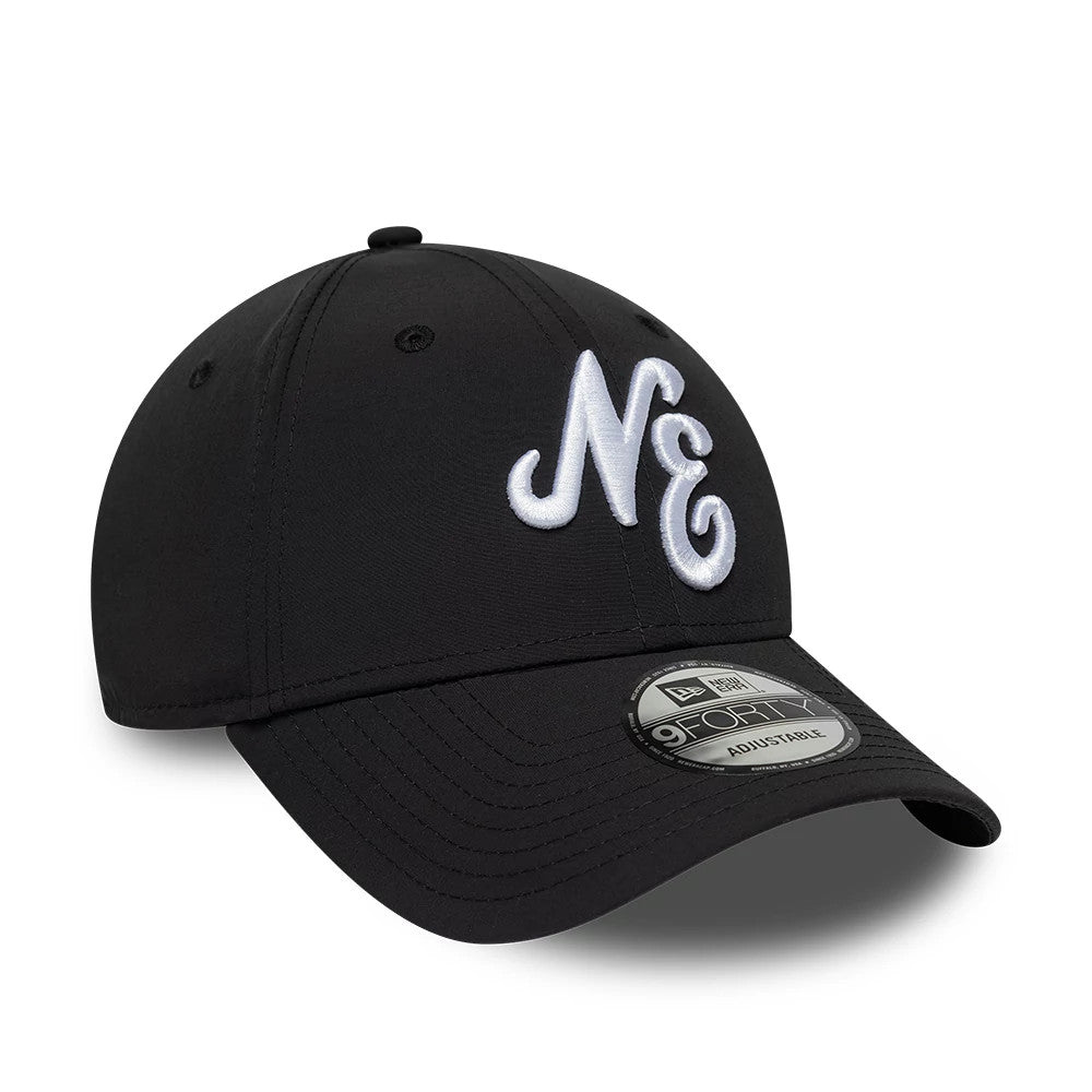 New Era Recycled Black 9FORTY Adjustable Cap, three-quarter view showing the large white embroidered NE logo on the front panel, complemented by a curved black visor with a 9FORTY size sticker, and black eyelets on the crown.
