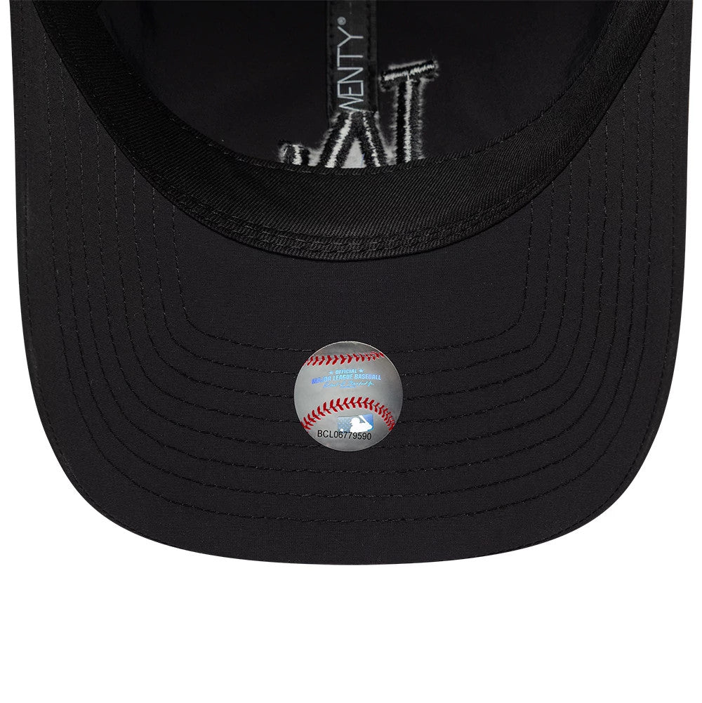 LA Dodgers MLB Recycled Black On Black New Era 9TWENTY Adjustable Cap, inside view showing an embroidered LA logo on the black undervisor, black sweatband, MLB holographic sticker with a baseball design, and woven taping.