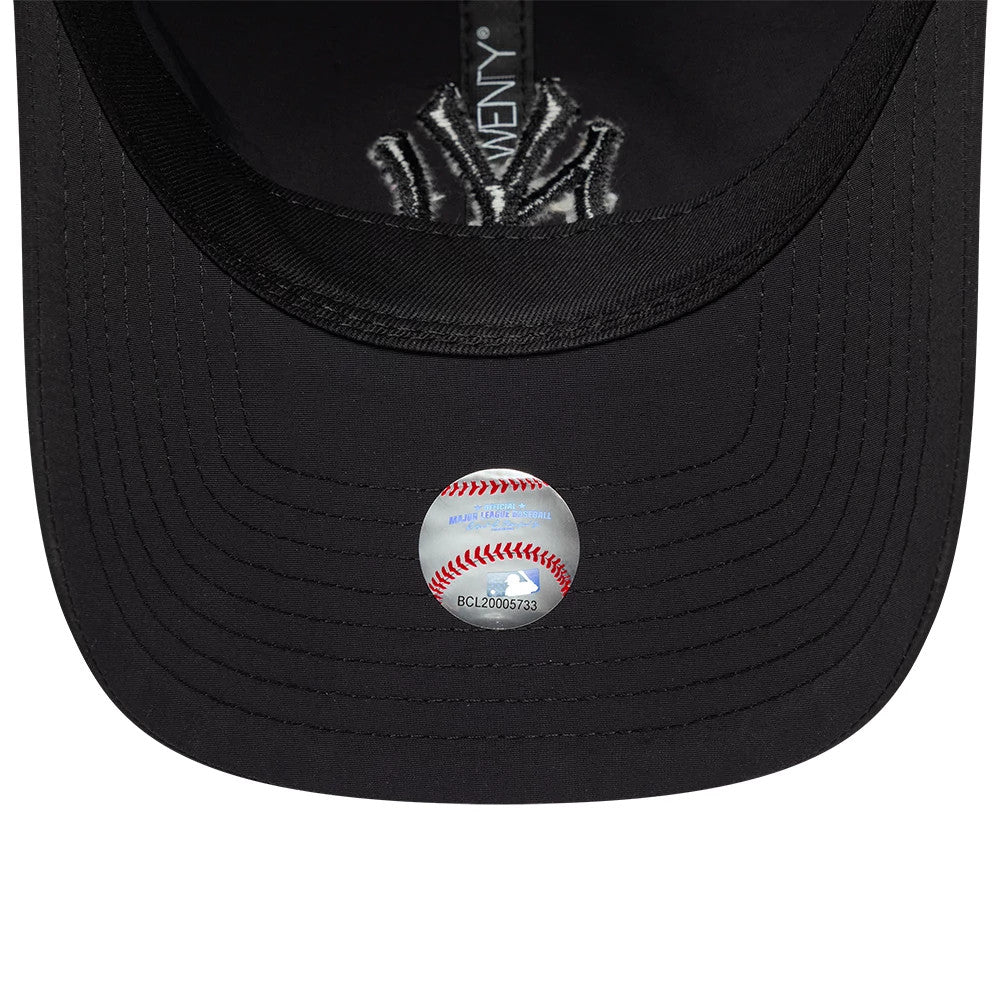 New York Yankees MLB Recycled Black On Black New Era 9TWENTY Adjustable Cap, inside view showing black undervisor with MLB hologram sticker, contrasted with white NY logo on black sweatband and New Era branding on internal taping.