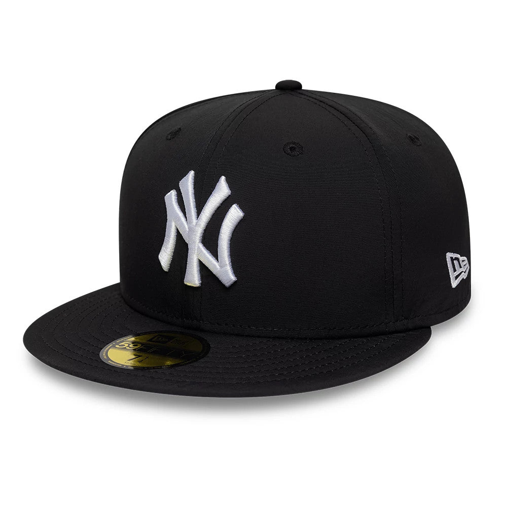 New York Yankees MLB Recycled Black New Era 59FIFTY Fitted Cap, front view showing the white embroidered NY logo on the structured black crown, with a matching black flat visor and a gold 59FIFTY size sticker on top.