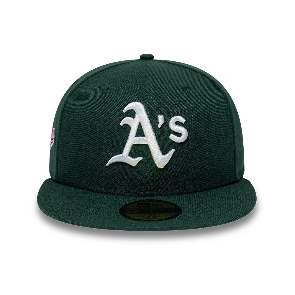 Pictured is this MLB Sidepatch Athletics 59FIFTY Fitted cap in dark green. 3