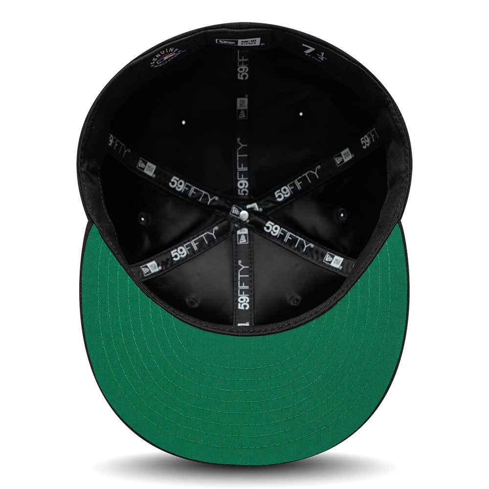 Chicago White Sox MLB Sidepatch Satin Lined Black New Era 59FIFTY Fitted Cap, inside view showing the green undervisor, black sweatband, and 59FIFTY-branded taping along with a size sticker under the structured black crown.