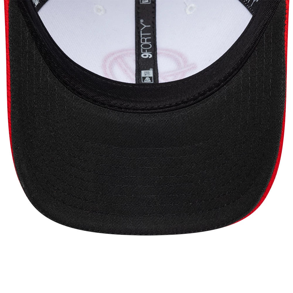 TGR Haas F1 Summer League Black New Era 9FORTY Adjustable Cap, inside view showing the black sweatband, the white taping with 9FORTY branding, and the contrasting red underlayer at the edge of the black curved visor.