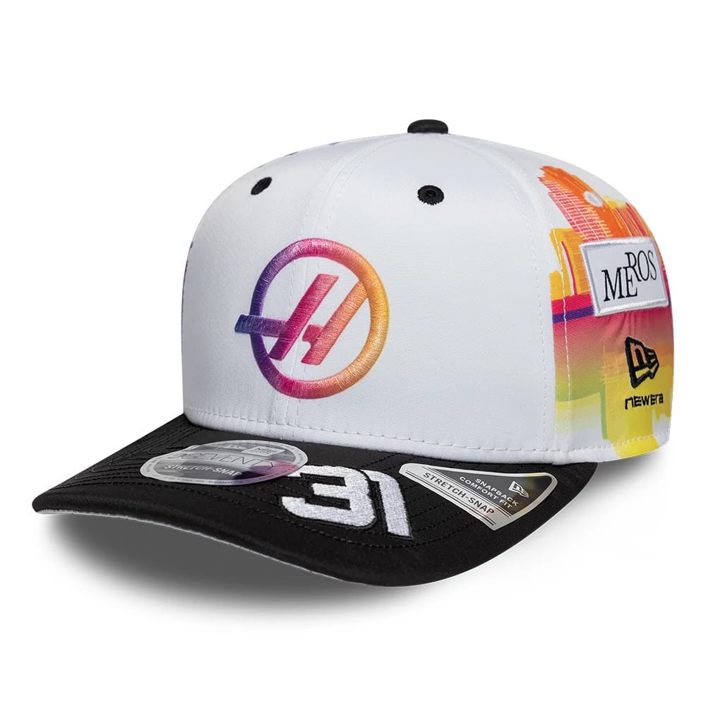 TGR Haas F1 Esteban Ocon Miami Race Special White New Era 9SEVENTY Stretch Snap Cap, three-quarter view showing a gradient-red to yellow embroidered logo on the front panel, black visor with white 31, and two 9SEVENTY size stickers.