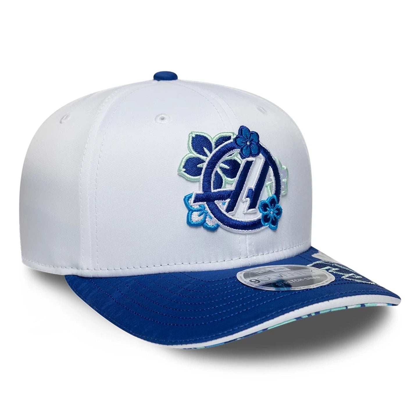 Pictured is this Esteban Ocon Japan Race Special TGR Haas F1 9SEVENTY Stretch Snap cap in white. 5