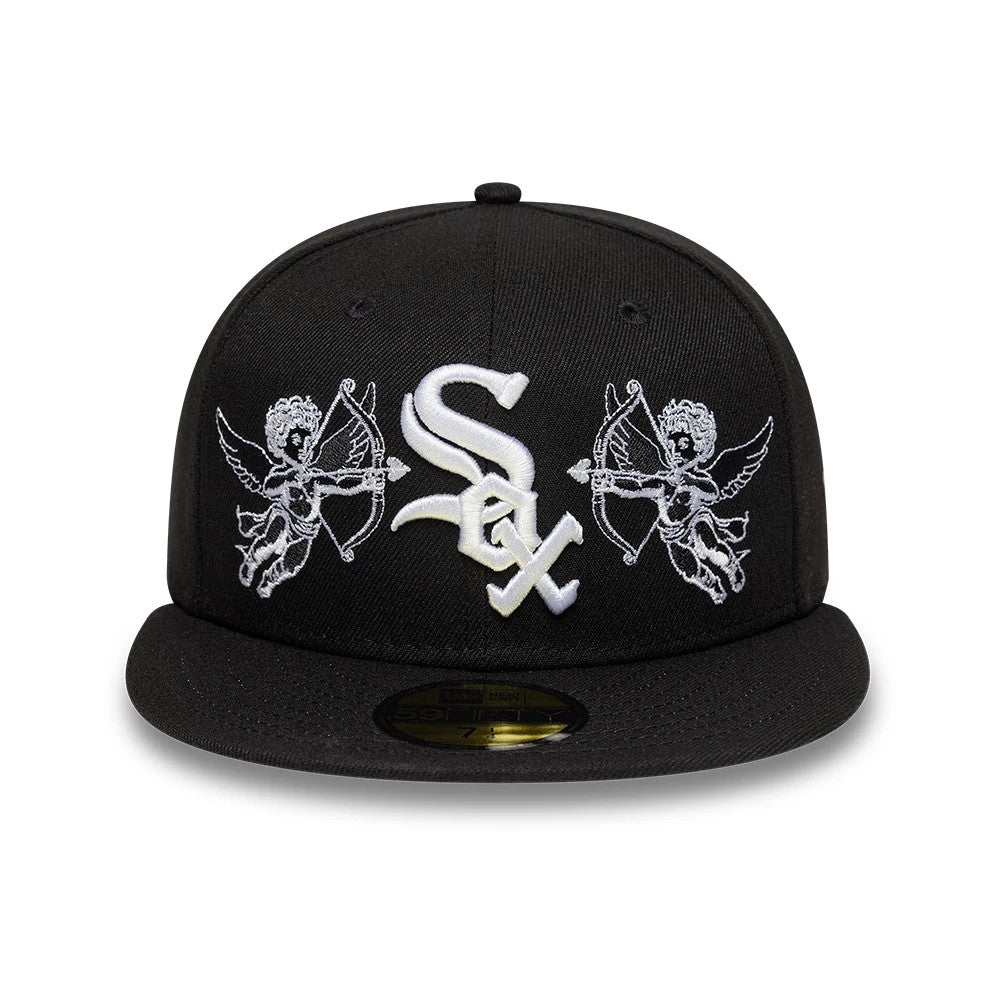 Chicago White Sox MLB Cherub Black New Era 59FIFTY Fitted Cap, front view showing raised white Sox logo embroidered on the front panel flanked by detailed cherub motifs, with a black flat visor and gold 59FIFTY size sticker underneath.