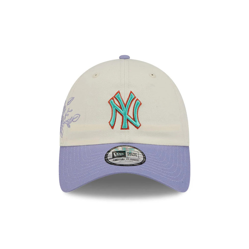 New Era New York Yankees MLB Lavender Flowers White Casual Classic Adjustable Cap, front view showing the raised teal NY logo with red outline on the front panel, a lilac curved visor with a silver size sticker.