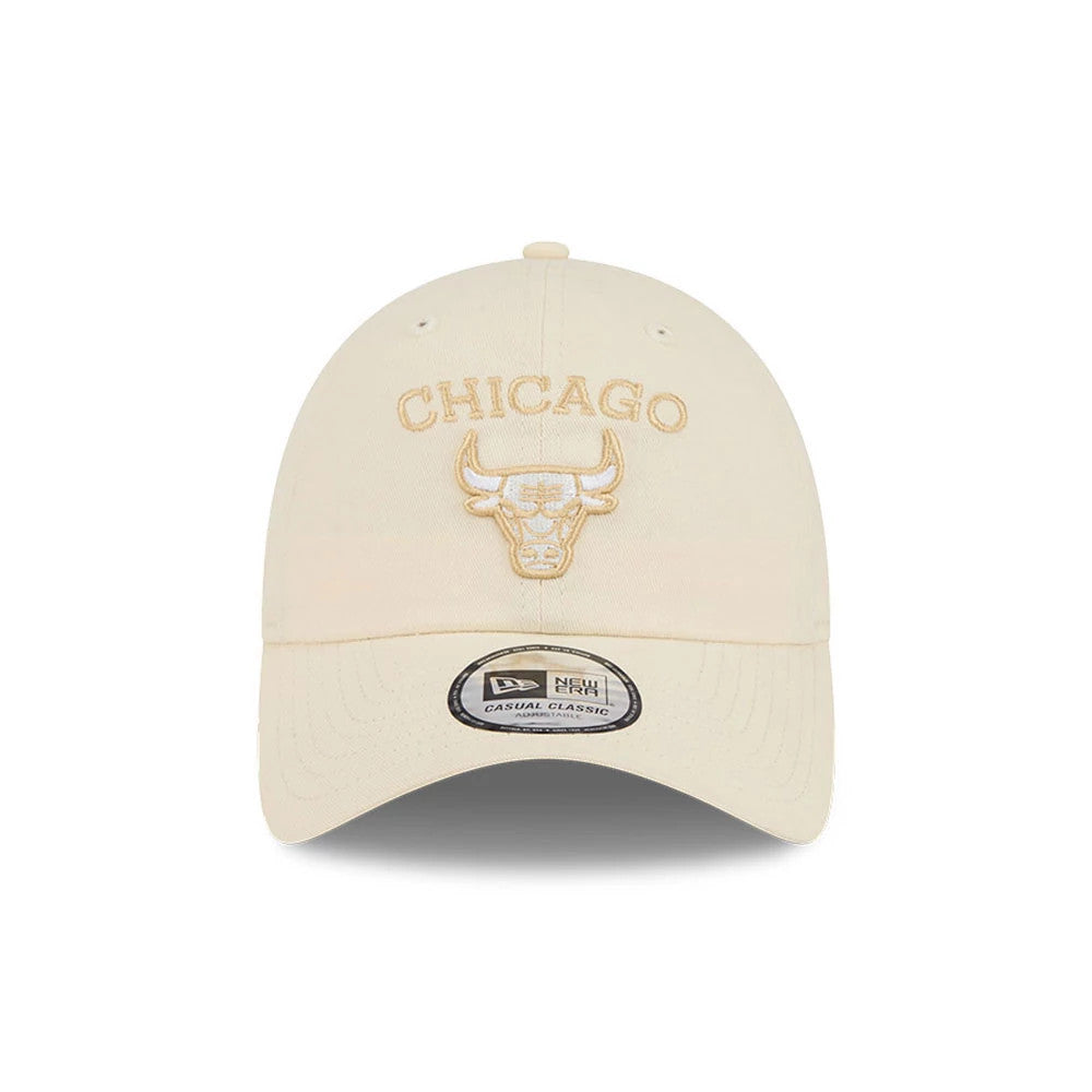 Chicago Bulls NBA Team Logo Beige New Era Casual Classic Adjustable Cap, front view showing beige embroidered Chicago Bulls logo and text on the front panels, pre-curved beige visor with Casual Classic size sticker, and a structured crown.