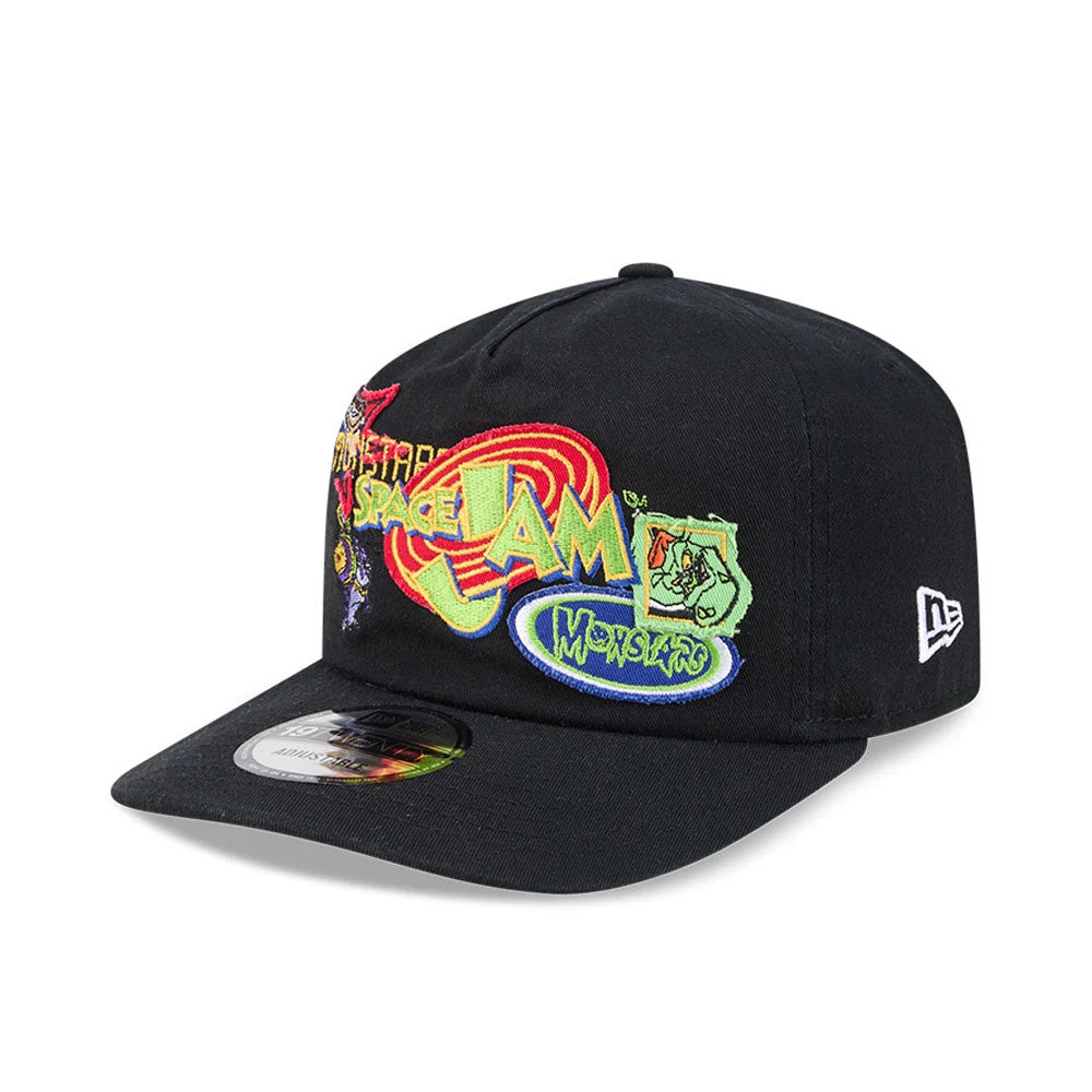 Space Jam Warner Brothers Space Jam Monstars Black New Era 19TWENTY Adjustable Cap, three-quarter view showing the colourful embroidered Space Jam and Monstars logos on the front panel, with a New Era flag logo on the left side.