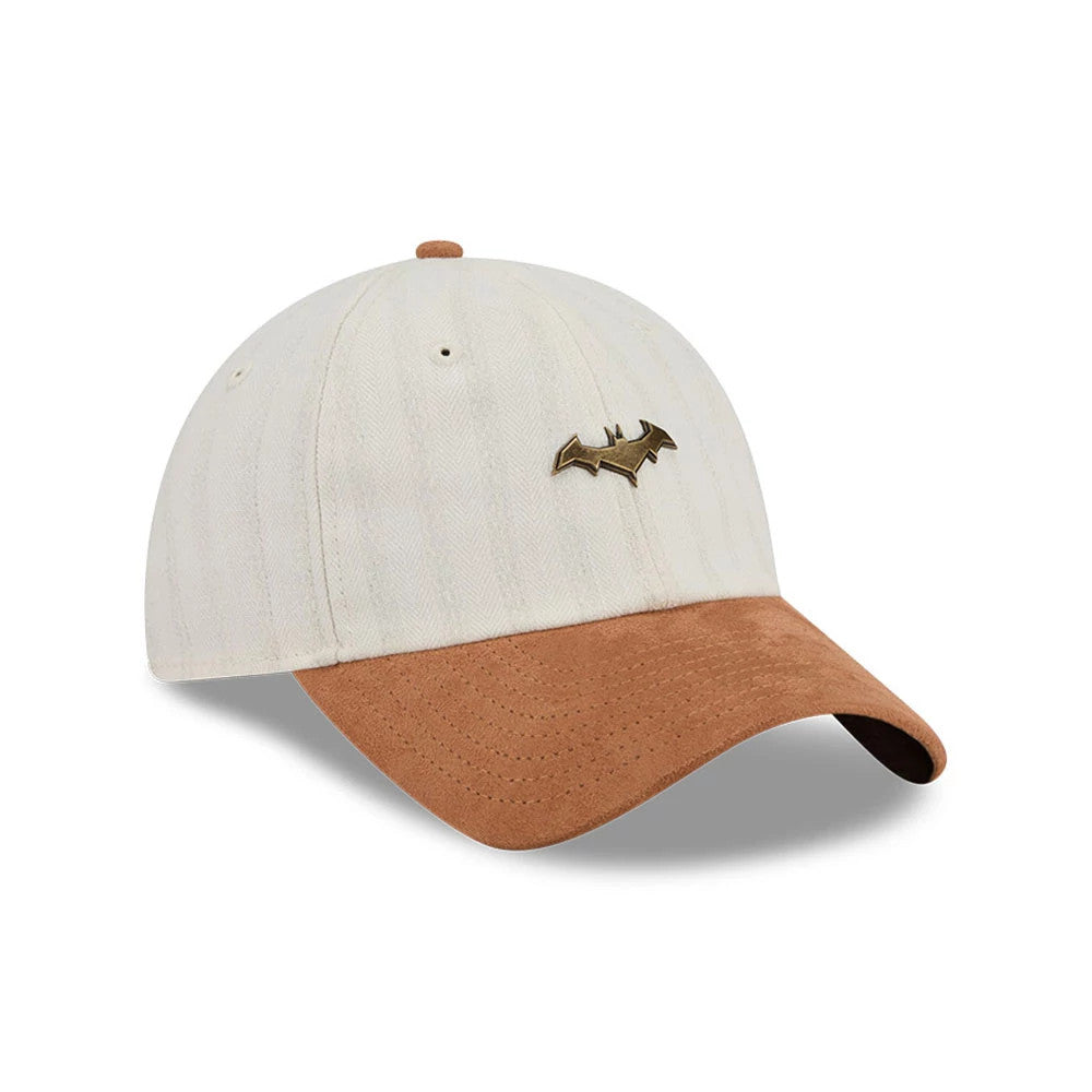 Womens DC Batgirl White New Era Casual Classic Adjustable Cap, front view showing a gold Batgirl emblem on the structured white crown, along with a brown curved visor and matching brown top button.