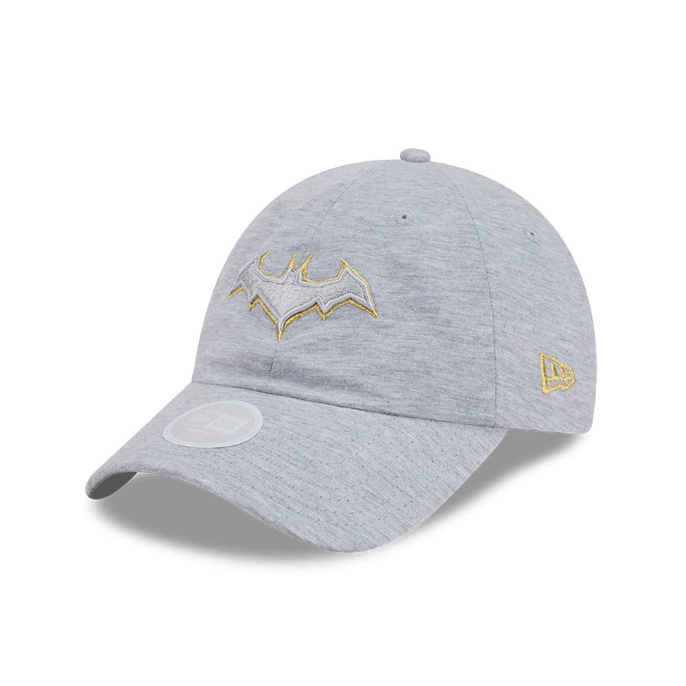 New Era Womens DC Batgirl Grey Open Back Cap, three-quarter view showing a grey cap with a raised gold and grey Batgirl emblem embroidered on the front panel, matching grey curved visor, and New Era flag logo on the left side.