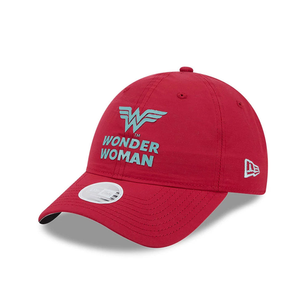 New Era Womens DC Wonder Woman Dark Red Open Back Cap, three-quarter view showing a raised turquoise Wonder Woman logo on the front panel, a curved visor with a 9FORTY size sticker, and the white embroidered New Era flag logo on the left side.