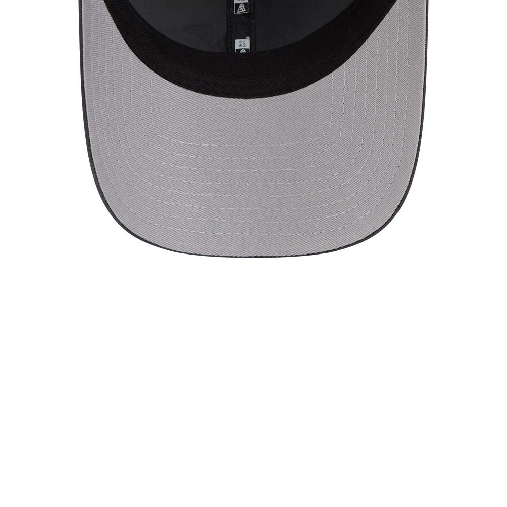 New Era Womens DC Batgirl Charcoal Open Back Cap, inside view showing a dark grey undervisor, black interior taping with a repeat New Era logo pattern, and a contrasting black sweatband along the edge of the structured crown.