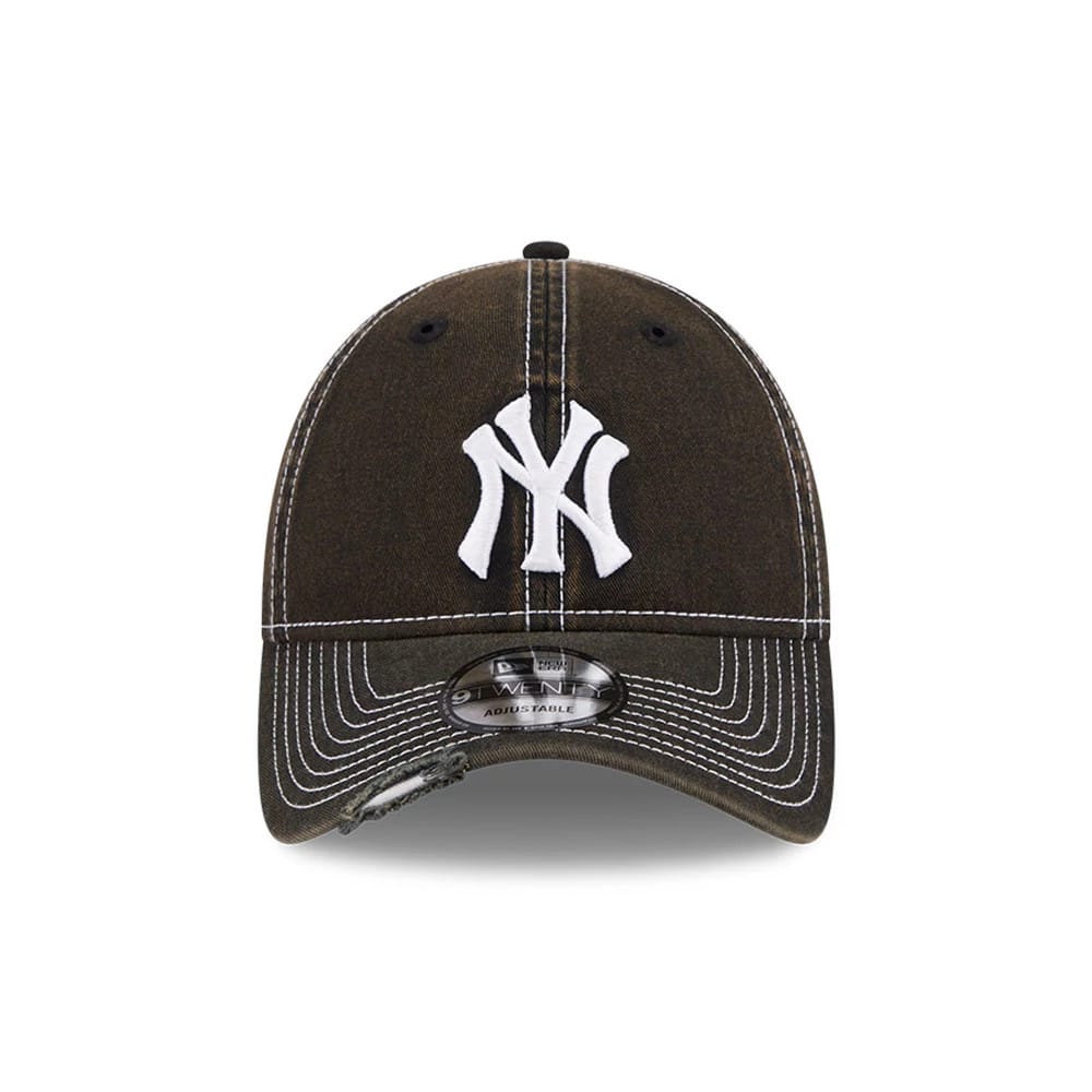 New York Yankees MLB Stencil Distressed Black New Era 9TWENTY Adjustable Cap, front view showing the white embroidered NY logo on the distressed black crown, featuring contrast white stitching and a 9TWENTY size sticker on the curved visor.