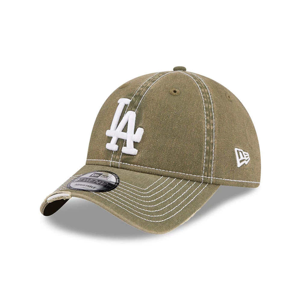 LA Dodgers MLB Stencil Distressed Green New Era 9TWENTY Adjustable Cap, three-quarter view showing a white raised LA logo on the front panel, a curved visor featuring a 9TWENTY size sticker, and contrasting white stitching throughout.