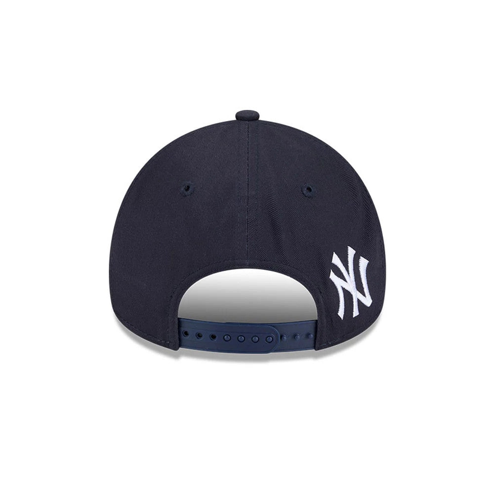 New York Yankees MLB Calligraphy Navy New Era 9FORTY A-Frame Adjustable Cap, rear view showing a white embroidered New York Yankees logo on the left side of the navy structured crown, with a classic snapback closure for adjustable sizing.