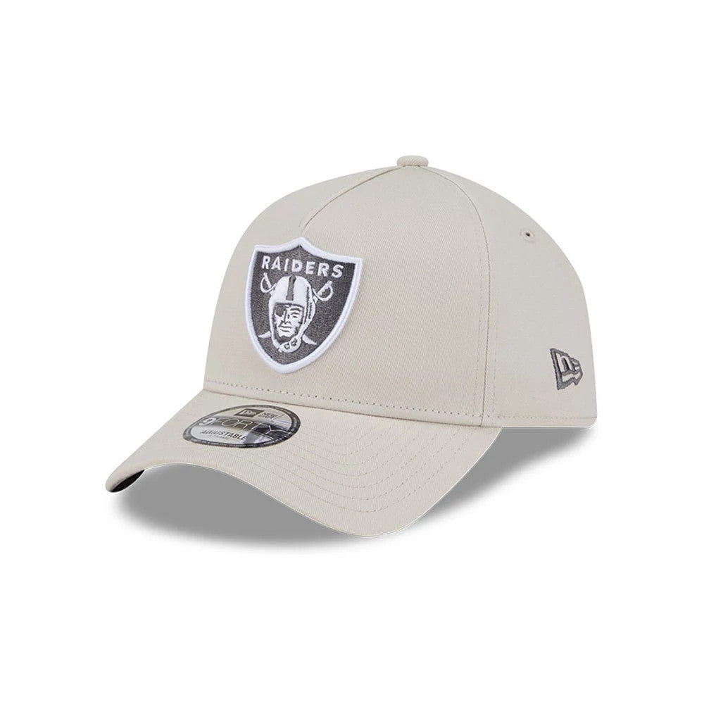 Las Vegas Raiders NFL Concrete Stone New Era 9FORTY A-Frame Adjustable Cap, three-quarter view showing the black and white Raiders shield logo embroidered on the front panel, with a matching size sticker on the curved stone visor.