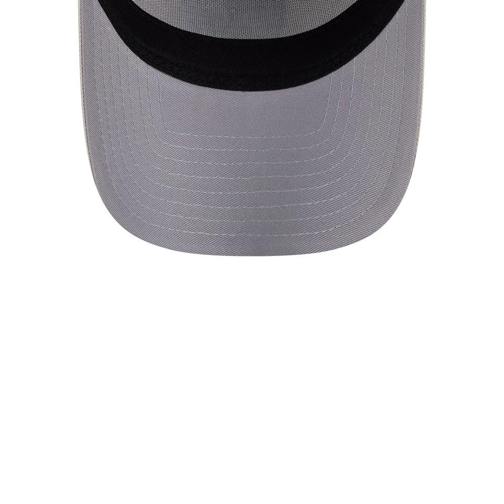 Las Vegas Raiders NFL Concrete Stone New Era 9FORTY A-Frame Adjustable Cap, inside view showing the light grey undervisor with stitching detail, alongside a distinct black sweatband lining the inner edge of the cap.