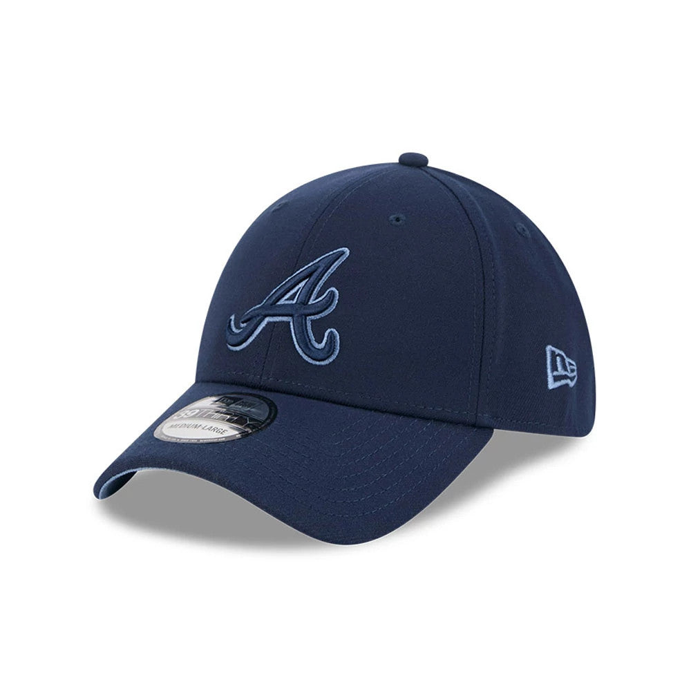Pictured is this MLB Faded Oceanside Atlanta Braves 39THIRTY Stretch Fit cap in dark blue. 1