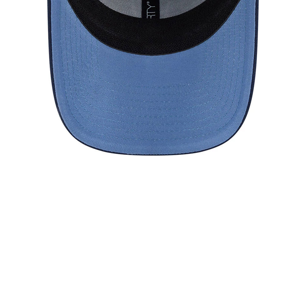 Yankees MLB Faded Oceanside Dark Blue New Era 39THIRTY Stretch Fit Cap, inside view showing a light blue undervisor, a black sweatband with stitching, and black taping along the interior seams of the structured crown.