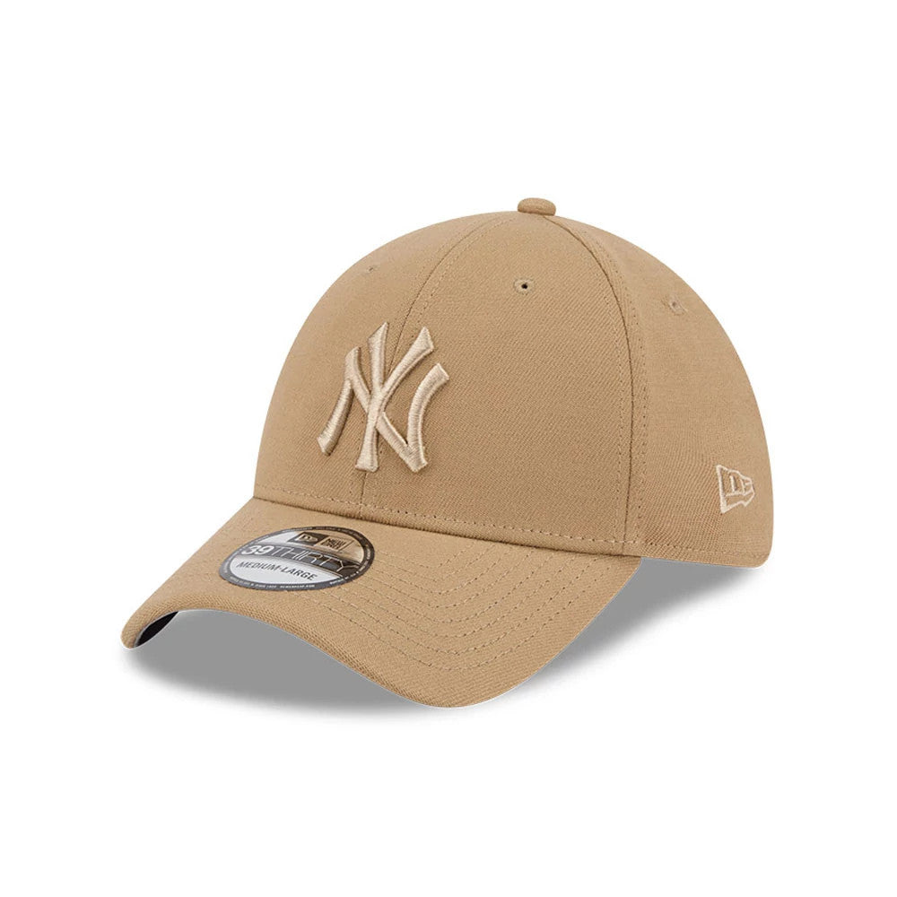 Pictured is this MLB New York Yankees 39THIRTY Stretch Fit cap in beige. 1
