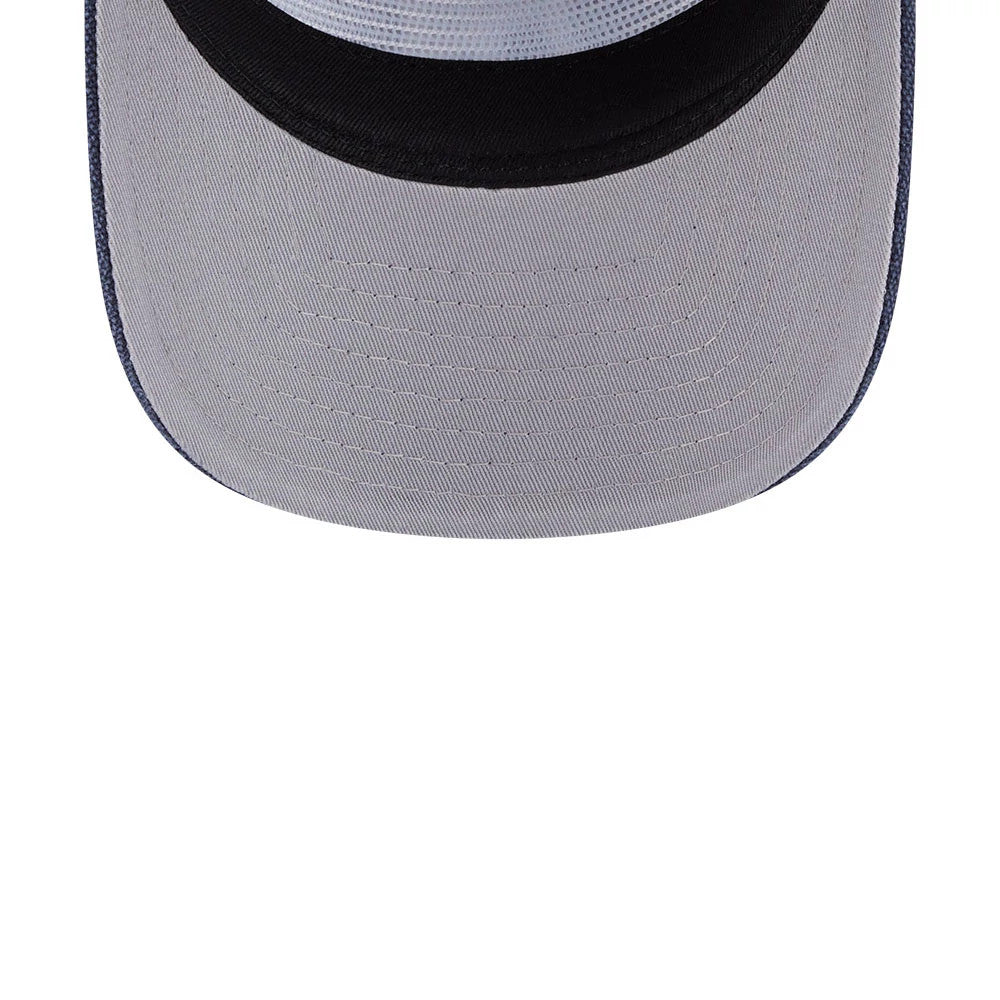 New York Yankees MLB Duck Canvas Navy New Era 19TWENTY Adjustable Cap, underside view showing the light grey undervisor, navy taping lined along the inside seams, and a deep navy band around the crown's interior edge.