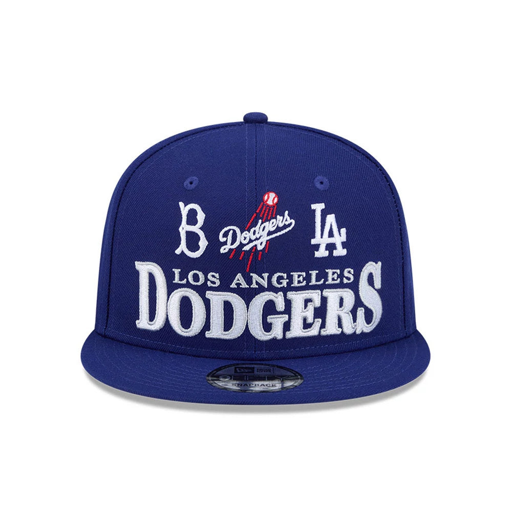 Pictured is this MLB Cooperstown Throwback LA Dodgers 9FIFTY Snapback cap in dark blue. 3