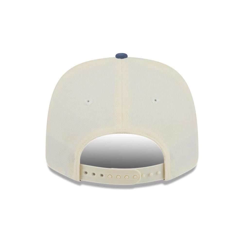 Pictured is this MLB Slate Stone LA Dodgers 9SEVENTY Stretch Snap cap in cream & dark blue. 7