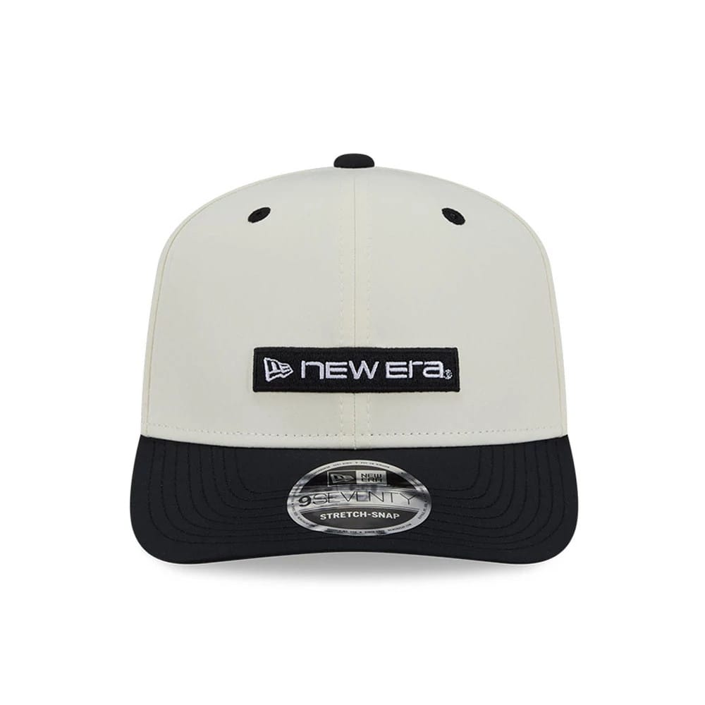 Pictured is this New Era Linear Logo 9SEVENTY Stretch Snap cap in white & black. 3