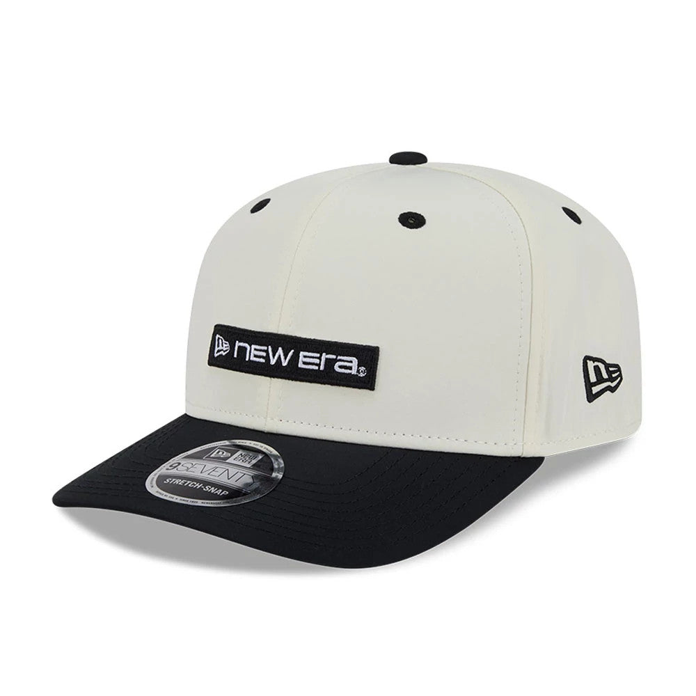 Pictured is this New Era Linear Logo 9SEVENTY Stretch Snap cap in white & black. 8