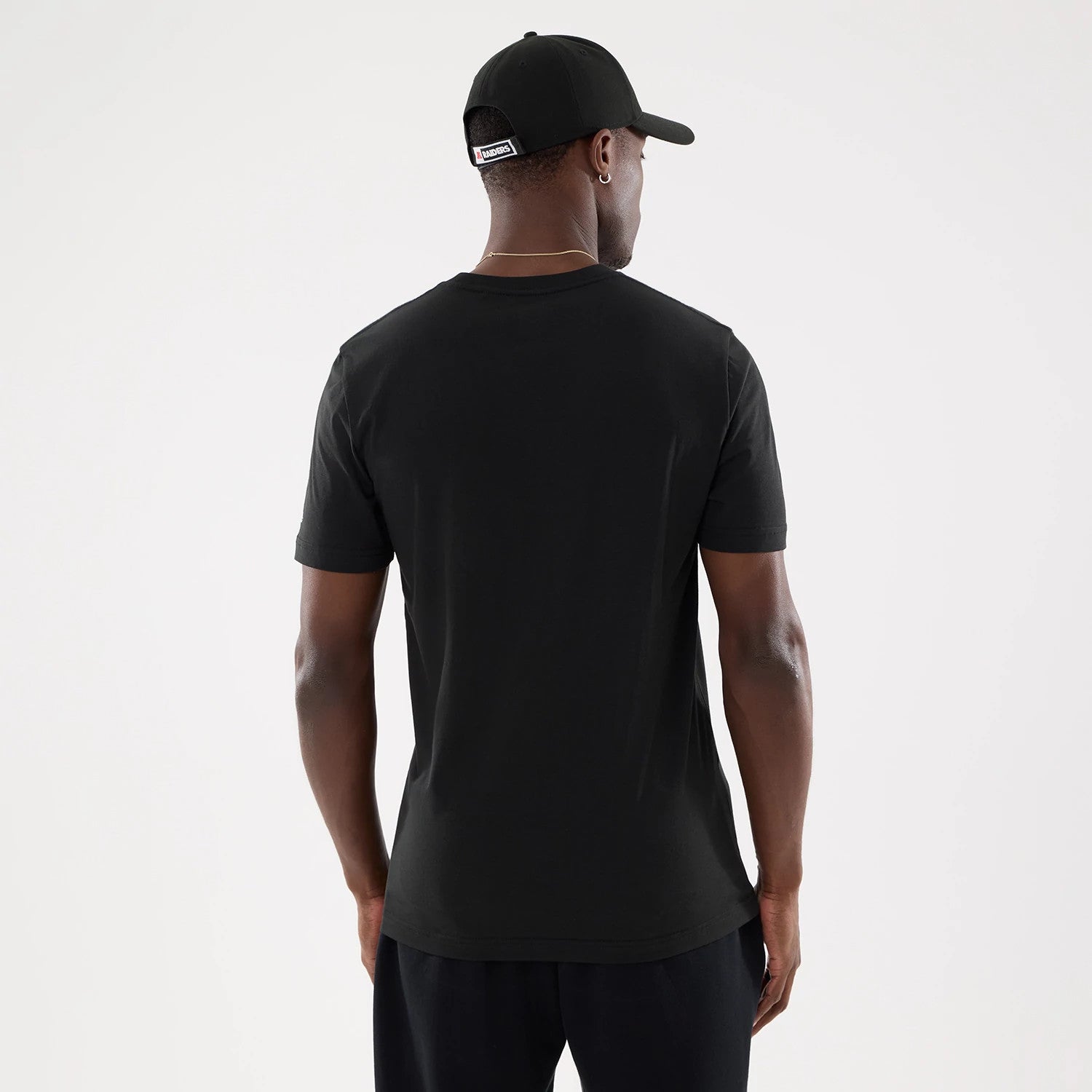 The model is wearing this NFL Training 2026 Las Vegas Raiders T-Shirt in black. 2