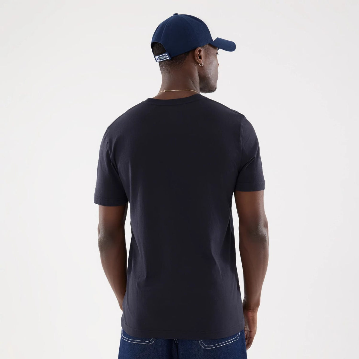 The model is wearing this NFL Training 2026 Dallas Cowboys T-Shirt in navy. 2