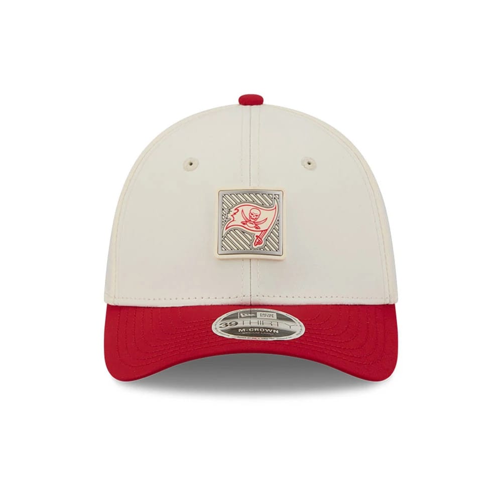 Buccaneers NFL Training 2026 White New Era 39THIRTY M-Crown Stretch Fit Cap, front view showing the red and silver Buccaneers logo in flat embroidery set on the structured white crown, with a red visor and 39THIRTY size sticker.