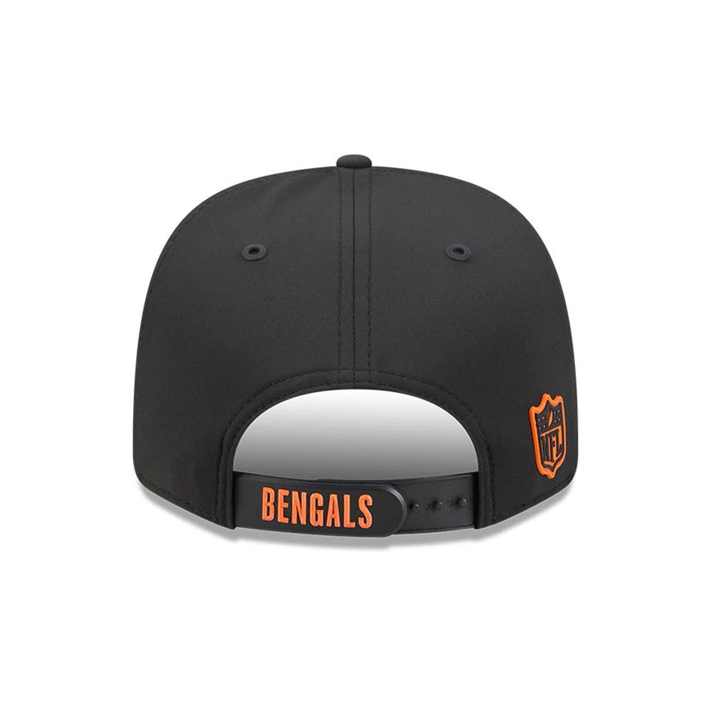 Bengals NFL Sideline 2026 Black New Era 9SEVENTY Stretch Snap Adjustable Cap, rear view showing the orange embroidered Bengals lettering on the black snapback closure, with the NFL logo on the right side of the black structured crown.